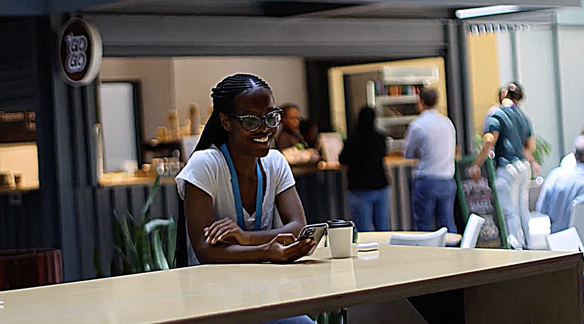 TP in Africa smiling employee having coffee